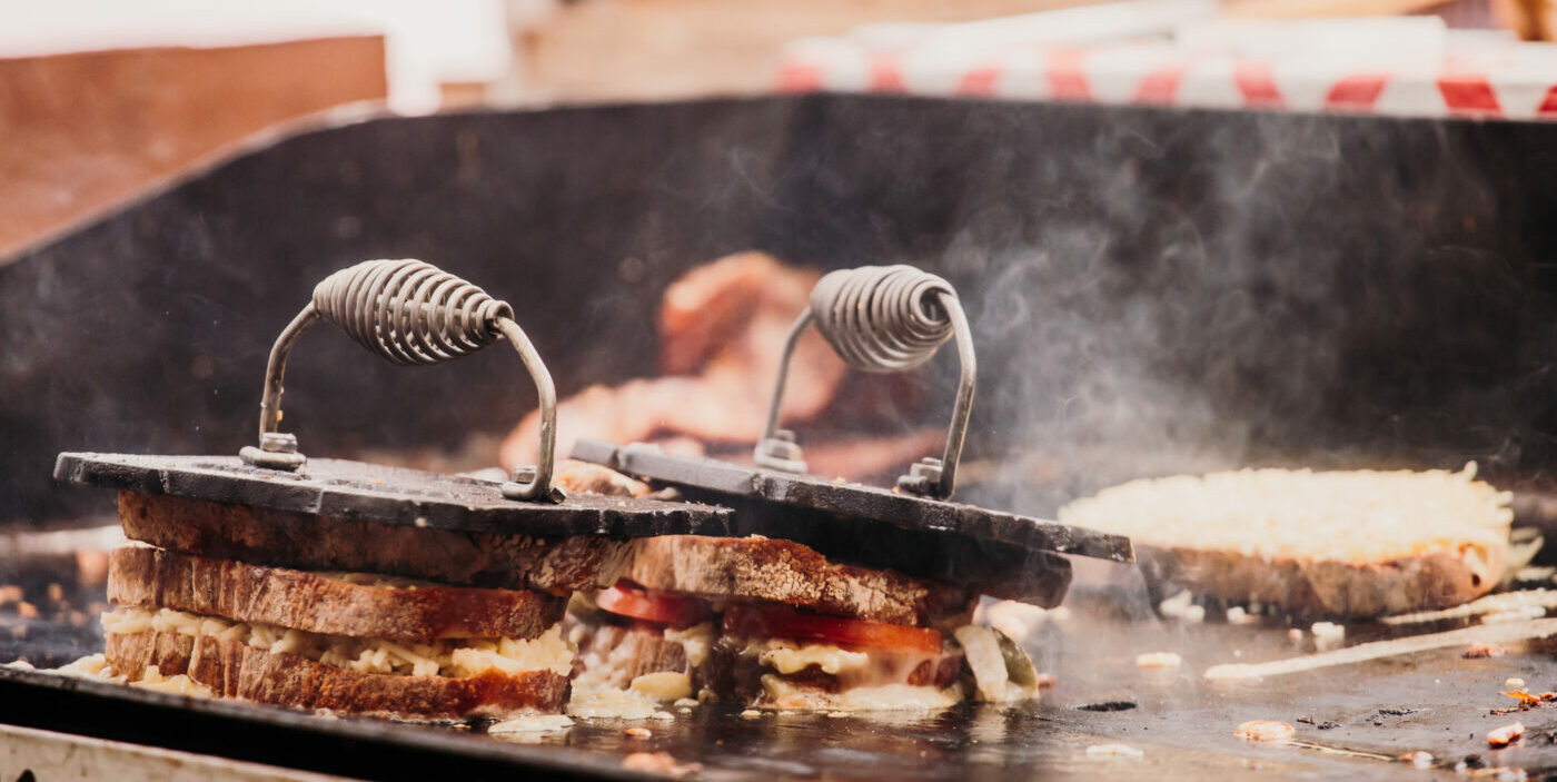 Toasties on the grill at Food Truck Fridays at Tobacco Factory; DJS, tap takeovers and food stalls the first friday of every month.